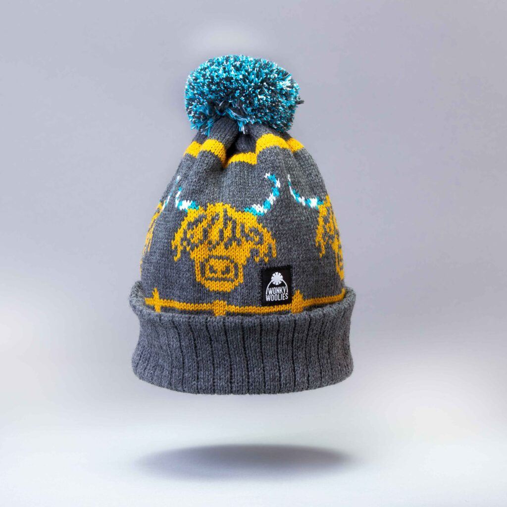 The grey and mustard colour way of our Highland Cow hat is very popular.