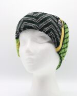 Image of a green, gold and silver headband worn around the ears.