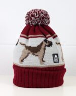 Image of a border terrier dog design on a burgundy bobble hat